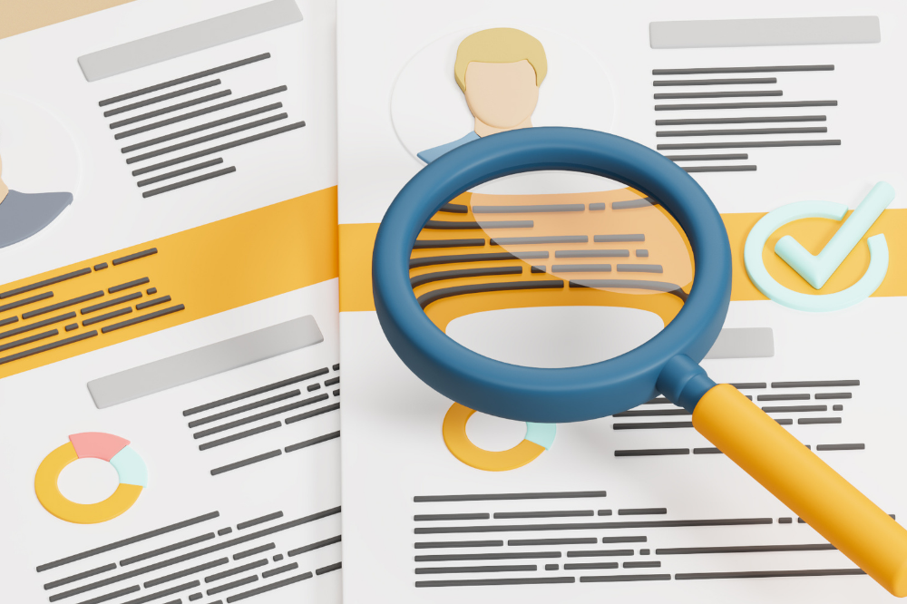 A magnifying glass over some documents